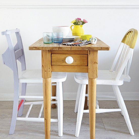 Small-dining-room-with-slimline-table-and-painted-chairs.jpg